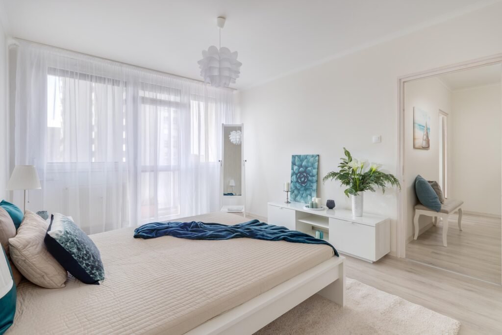 bright bedroom with the bed